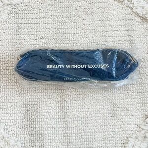 beautycounter Navy Zip Pouch with 'Beauty Without Excuses' Slogan